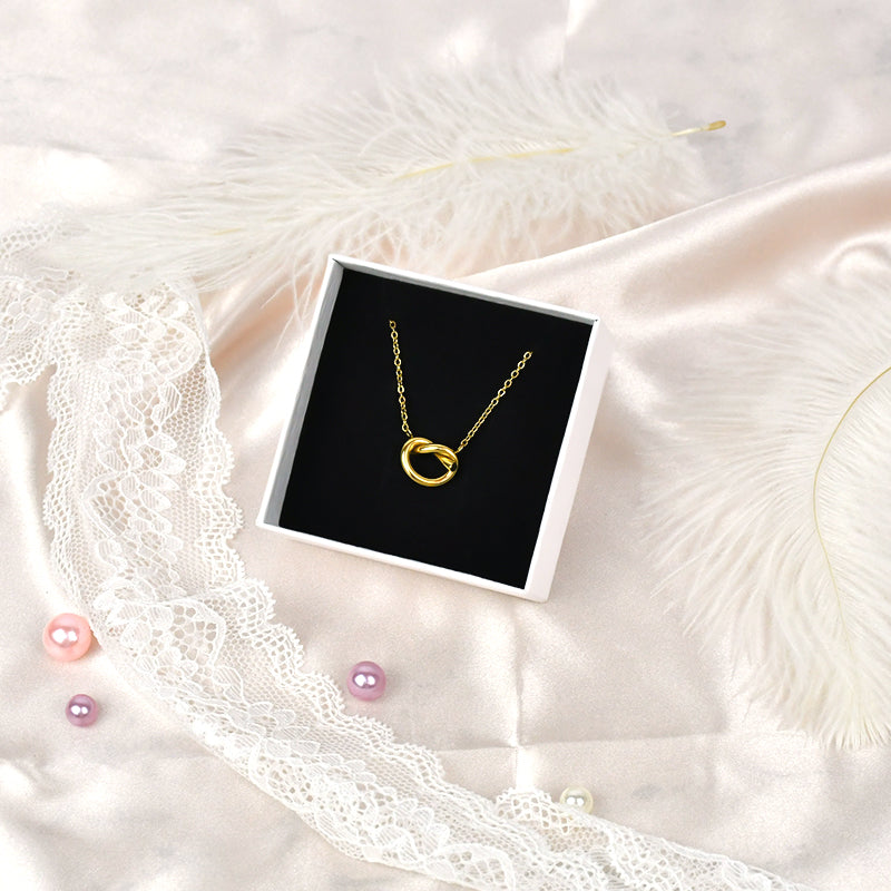 Everythingifts Golden Hour jewelry gift set with knotted necklace, jewelry case, teddy bear towel, glass tumbler, and satin scrunchie