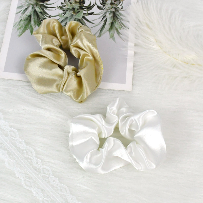 Everythingifts Golden Hour jewelry gift set with knotted necklace, jewelry case, teddy bear towel, glass tumbler, and satin scrunchie